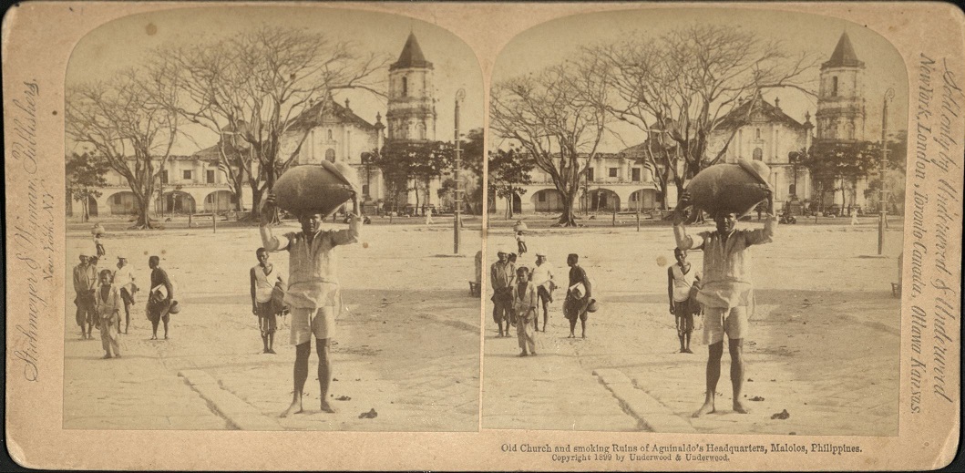 Old Church and smoking Ruins of Aguinaldo’s Headquarters, Malolos, Philippines.